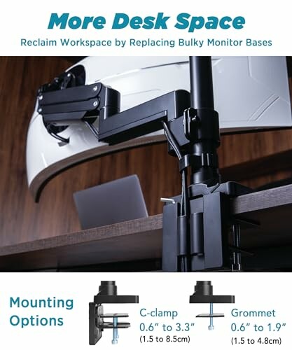 Monitor arm creating more desk space with C-clamp and grommet options.