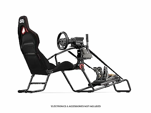 Racing simulator seat with steering wheel and pedal setup.